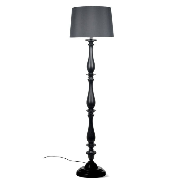 Tanner black and glass floor outlet lamp