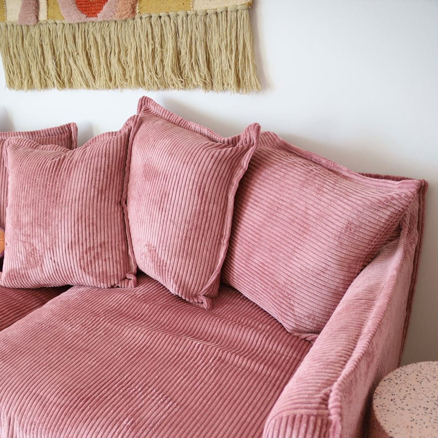 Blush sofa outlet cushions